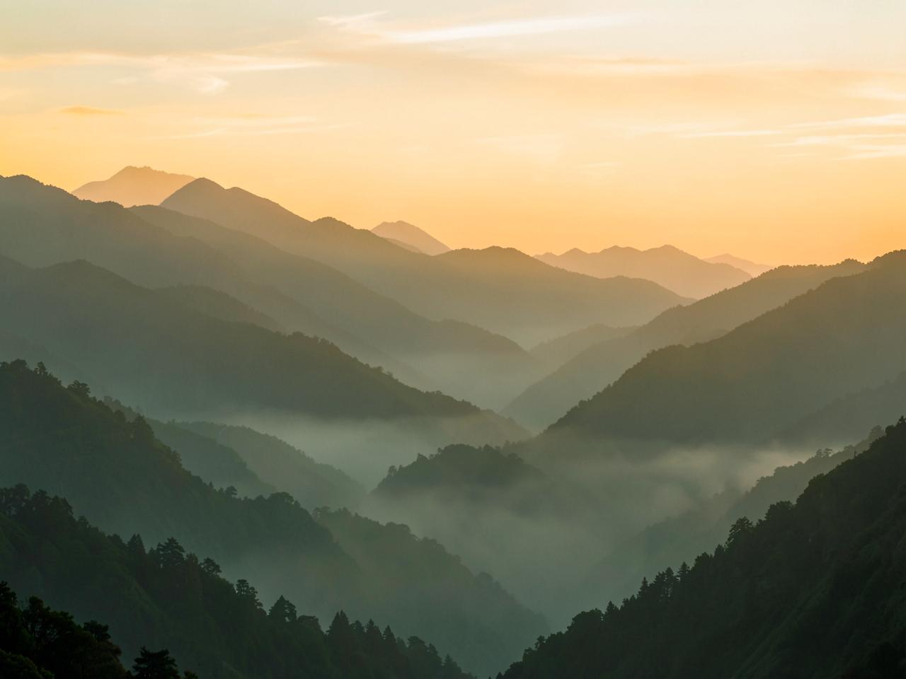 Early morning mountain range at sunrise